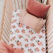 Load image into Gallery viewer, Snuggle Hunny Kids Rosebud Fitted Cot Sheet shown on a cot bed with throw and pillows on top