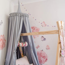Load image into Gallery viewer, grey round canopy hanging in girls toddler room above timber house bed. Pink and purple floral wall decals and pink accents around the room