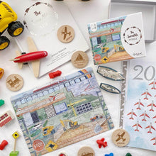 Load image into Gallery viewer, incredible transportation puzzle complete laying on table surrounded by wooden toys and vehicles.
