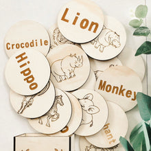 Load image into Gallery viewer, hand made circular timber discs etched with safari animals and name names