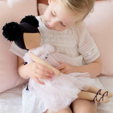 Load image into Gallery viewer, Alimrose Valentina Pom Pom Doll - Sparkle Pink - 48cm being held by a young girl with cusions behind her