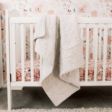 Load image into Gallery viewer, Alimrose Cloud Soft Quilt in Dove Grey displayed on a cot bed 