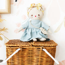 Load image into Gallery viewer, Alimrose Mini Lilly Kitty Grey Linen in medium sitting on a rattan basket 