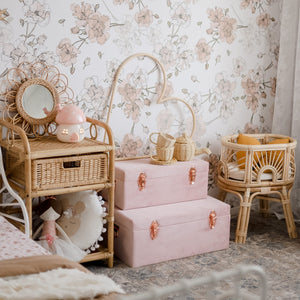 set of two dusty pink storage cases in girls bedroom 