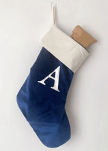 Load image into Gallery viewer, Navy blue velvet stocking personalised with the letter A in silver metallic font