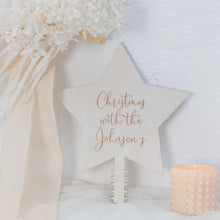 Load image into Gallery viewer, persoanlised star christmas topper leaning against a white wall