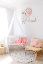 Load image into Gallery viewer, white drape canopy in girls nursery drapped over white bassinet with pink details and decorations