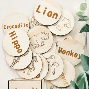 hand made circular timber discs etched with safari animals and name names 
