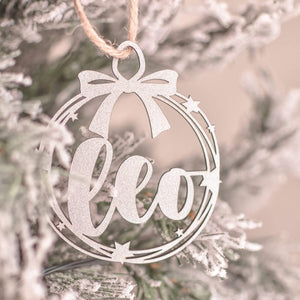 round silver personalised christmas bauble hanging on tree